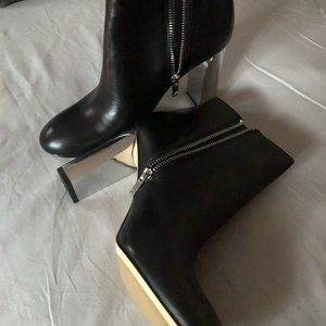 Amazing never worn black silver heel boots! Size 9